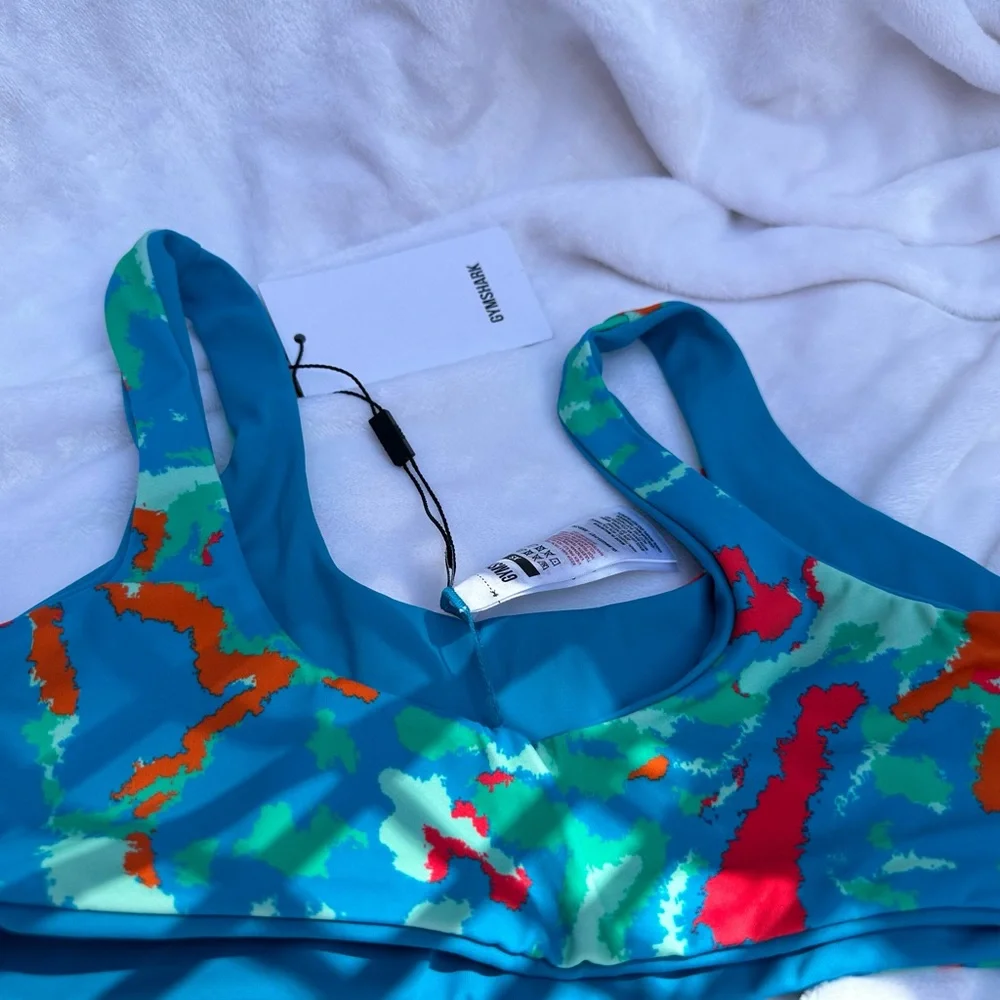 NWT- Gymshark blue/green/red reversible bikini‎ top.